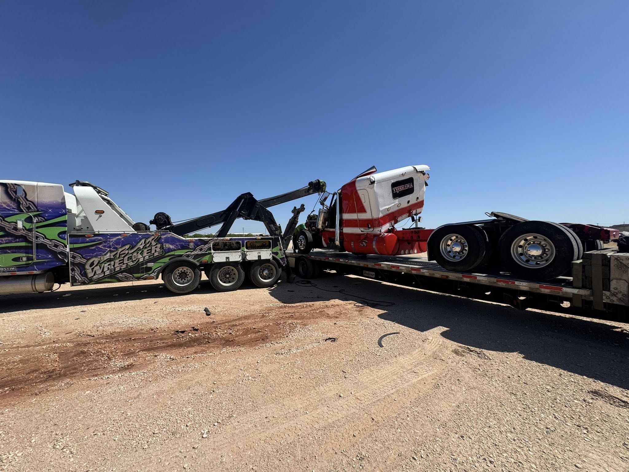 O'Bar recovery truck loading a commercial vehicle