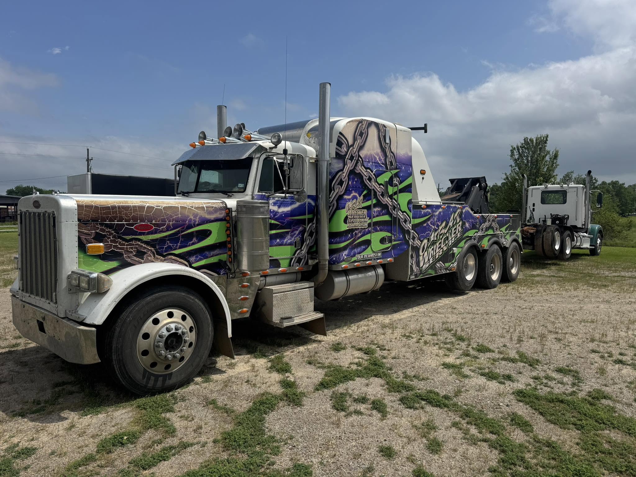 O'Bar heavy wrecker parked at a job site